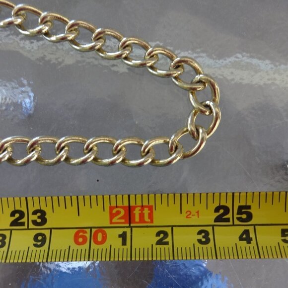 Steve Madden cross body mini purse matt gold with a gold tone chain zip closure - Picture 15 of 15